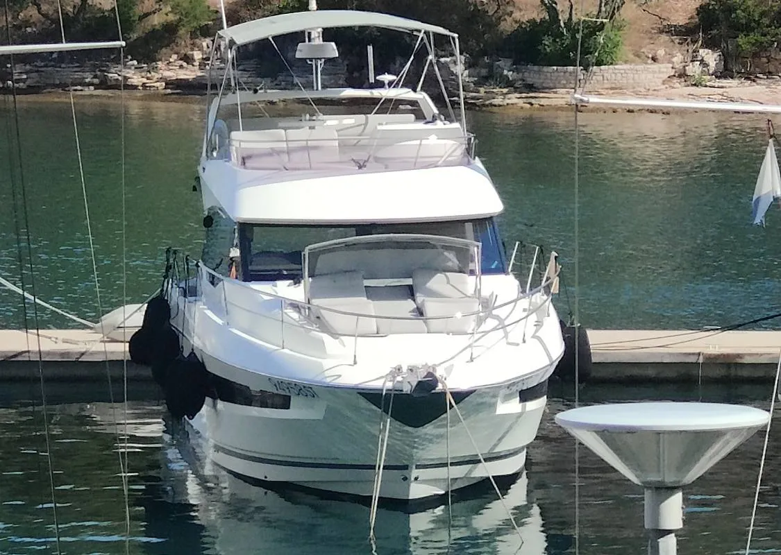 Exterior view of Adudu 2, a Jeanneau Prestige 460 Fly motor yacht at Dubrovnik, Croatia
