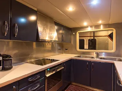 Galley of Troy Explorer, a Chung Hwa Boat Building Co. Ltd Trawler 77 motor yacht at Bodrum, Turkey