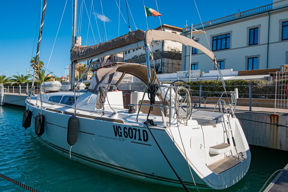 Exterior view of Ribellina, a Jeanneau Sun Odyssey 33i sailboat at San Vincenzo, Italy