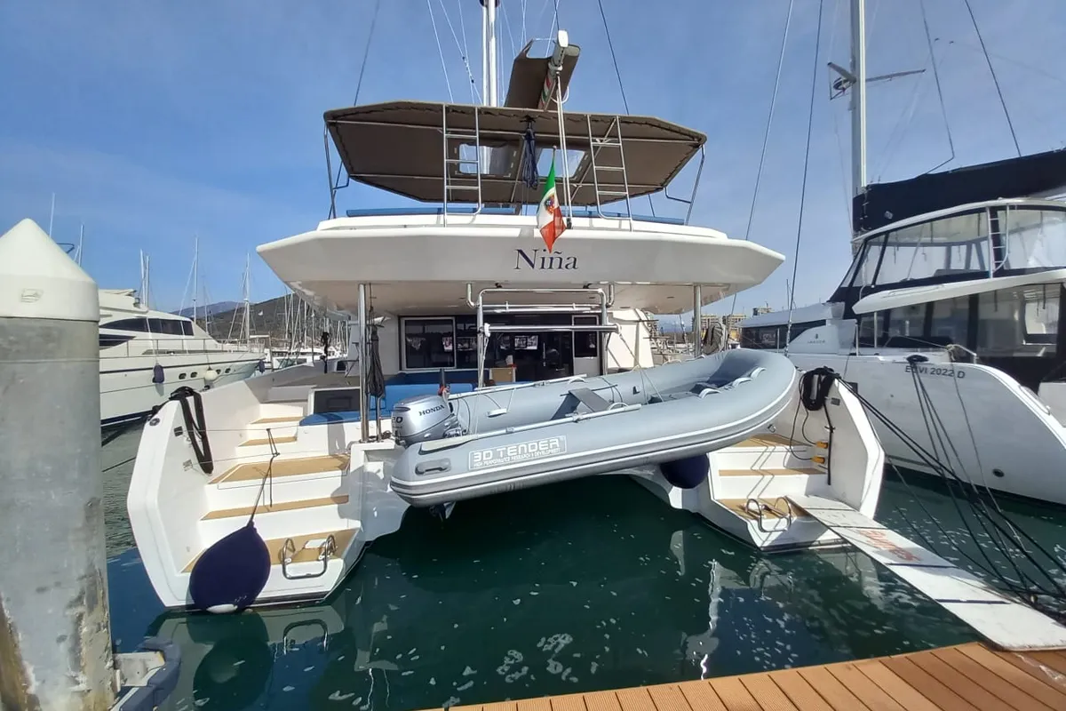 Exterior view of Niña, a Dufour Catamaran 48 catamaran at Cannigione, Italy