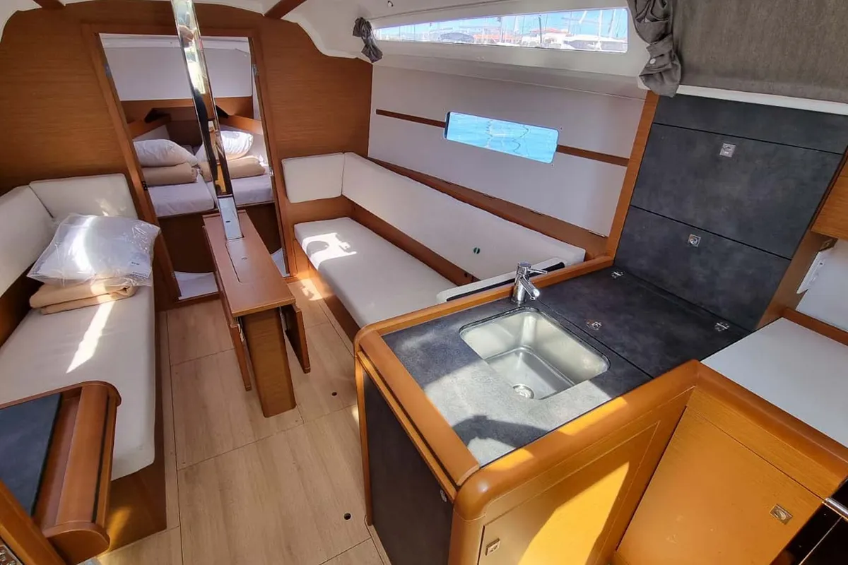 Salon of Capraia, a Jeanneau Sun Odyssey 349 sailboat at Figari/Golfo Aranci, Italy