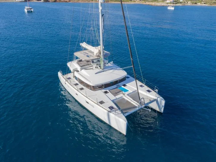 Exterior view of DELUXE, a Lagoon 52F catamaran at Sant Antoni de Portmany, Spain