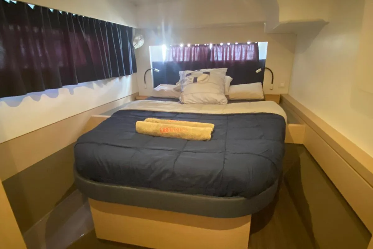 Libertad VII, a Fountaine Pajot Astréa 42 catamaran at Sant Antoni de Portmany, Spain