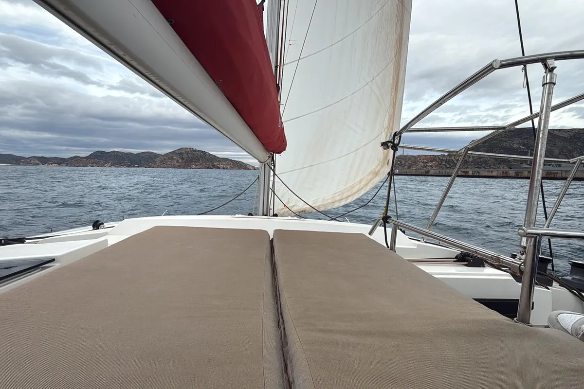 Libertad VII, a Fountaine Pajot Astréa 42 catamaran at Sant Antoni de Portmany, Spain