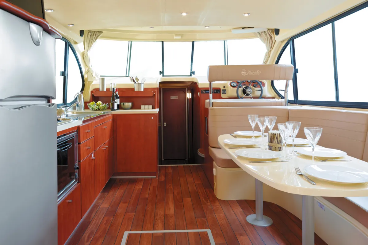 Galley of Opus, a Nicols Estivale Sixto motorboat at Grez-Neuville, France