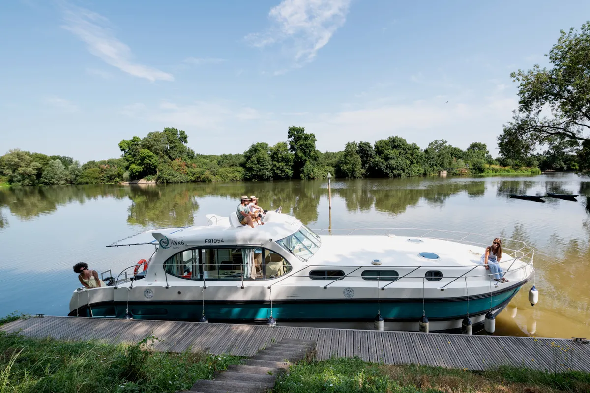 Exterior view of Opus, a Nicols Estivale Sixto motorboat at Grez-Neuville, France