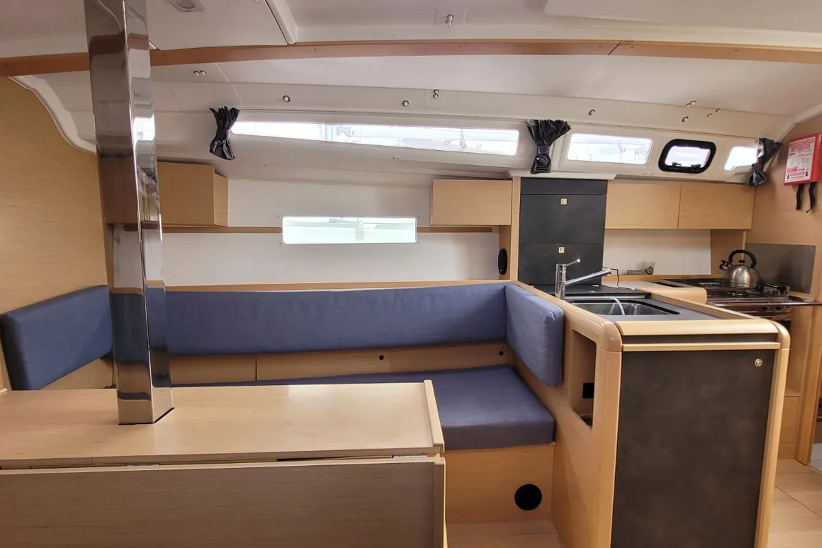 Salon of Kokozenn 2, a Jeanneau Sun Odyssey 349 sailboat at Saint-Cast-le-Guildo, France