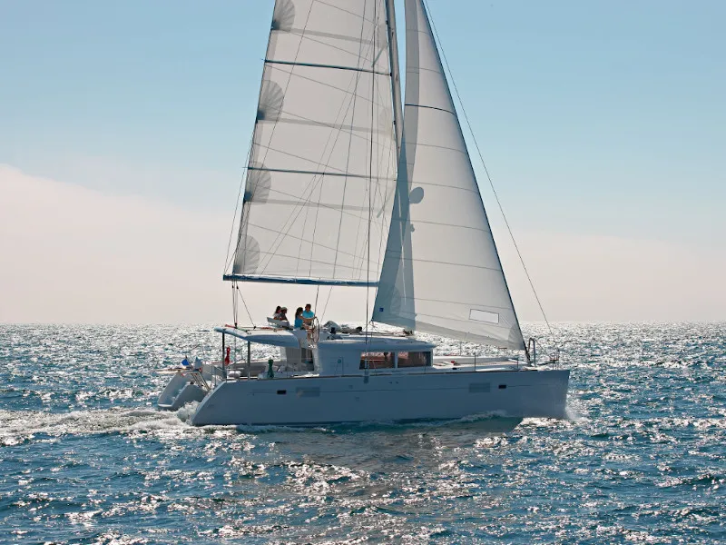 Exterior view of Caliente, a Lagoon 450 Fly catamaran at Thira, Greece
