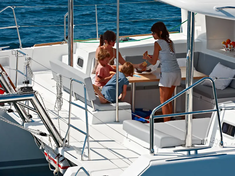 Deck of Caliente, a Lagoon 450 Fly catamaran at Thira, Greece