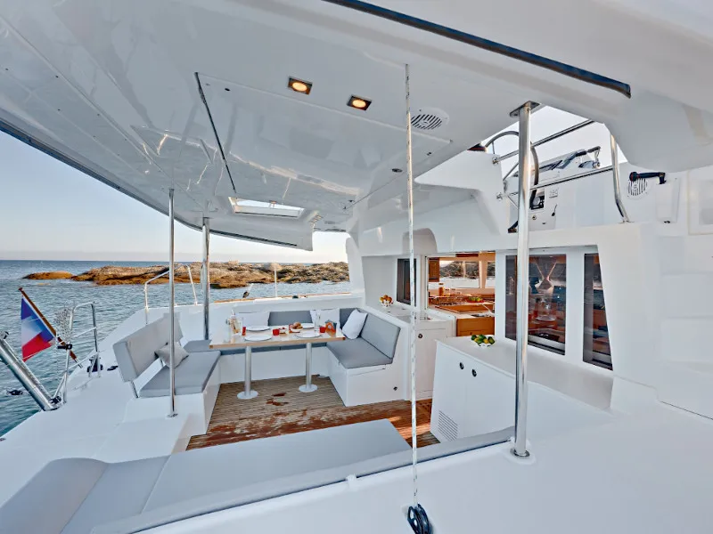 Deck of Caliente, a Lagoon 450 Fly catamaran at Thira, Greece