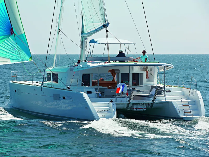 Exterior view of Caliente, a Lagoon 450 Fly catamaran at Thira, Greece