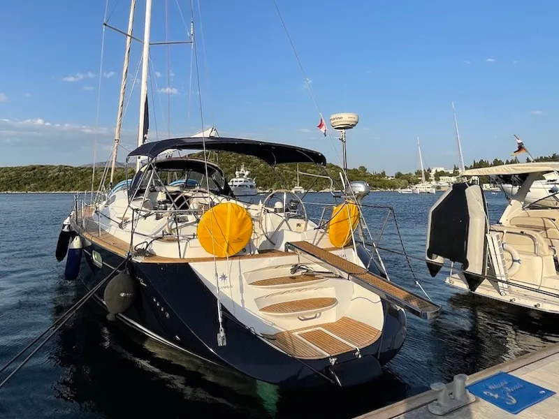 Exterior view of Olivia Adriatica, a Jeanneau Sun Odyssey 54 DS sailboat at Grad Šibenik, Croatia
