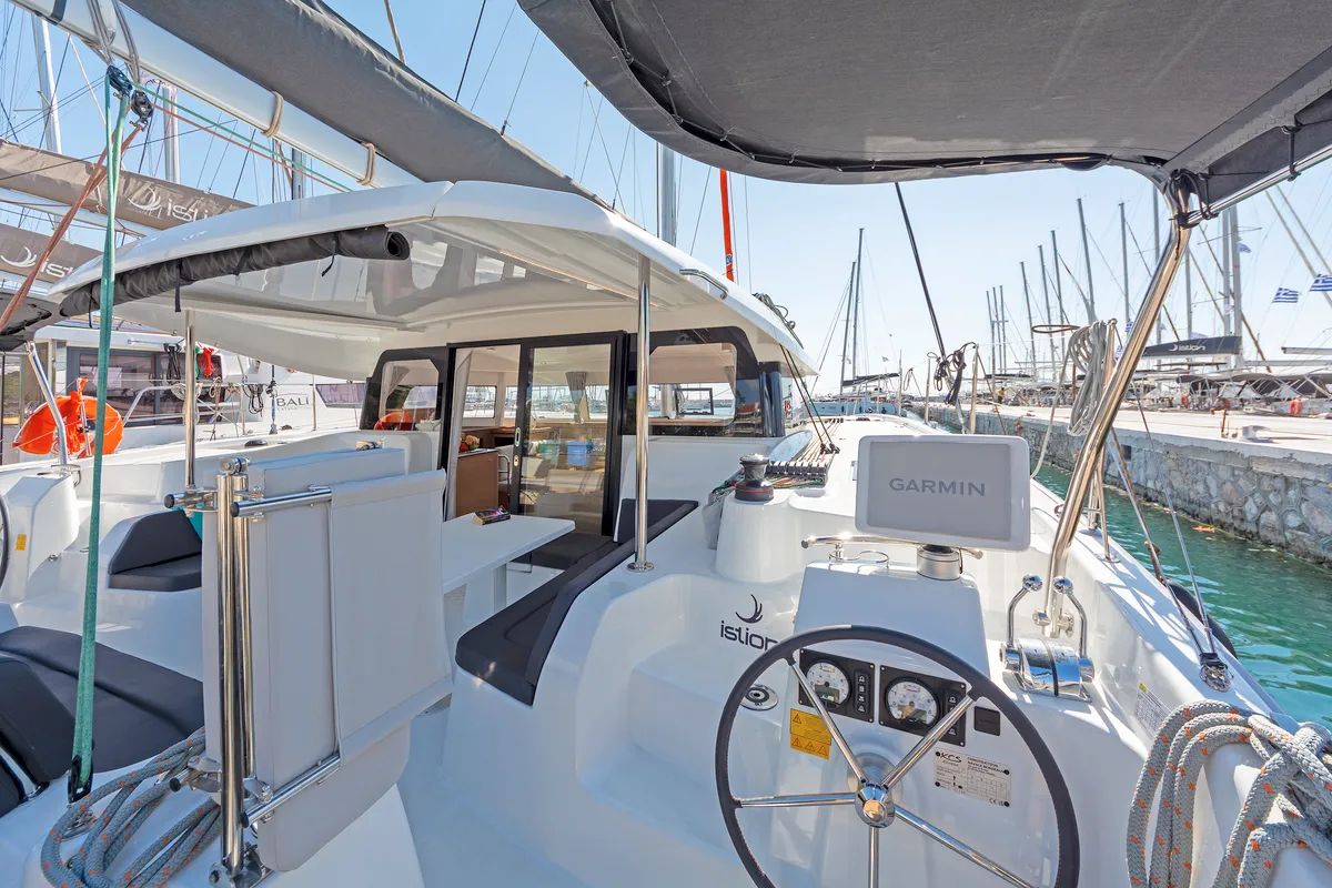 Cockpit of Little Blue Ocean, a Excess 11 catamaran at Parikia, Greece