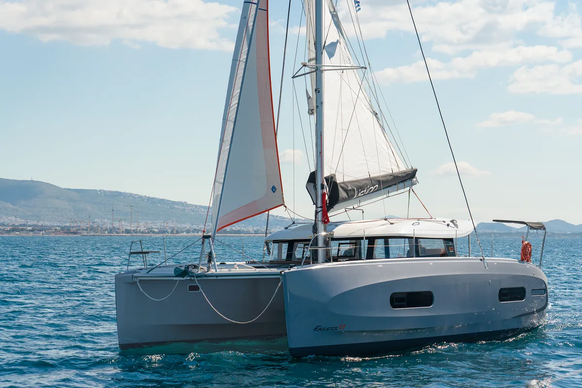 Exterior view of Little Blue Ocean, a Excess 11 catamaran at Parikia, Greece