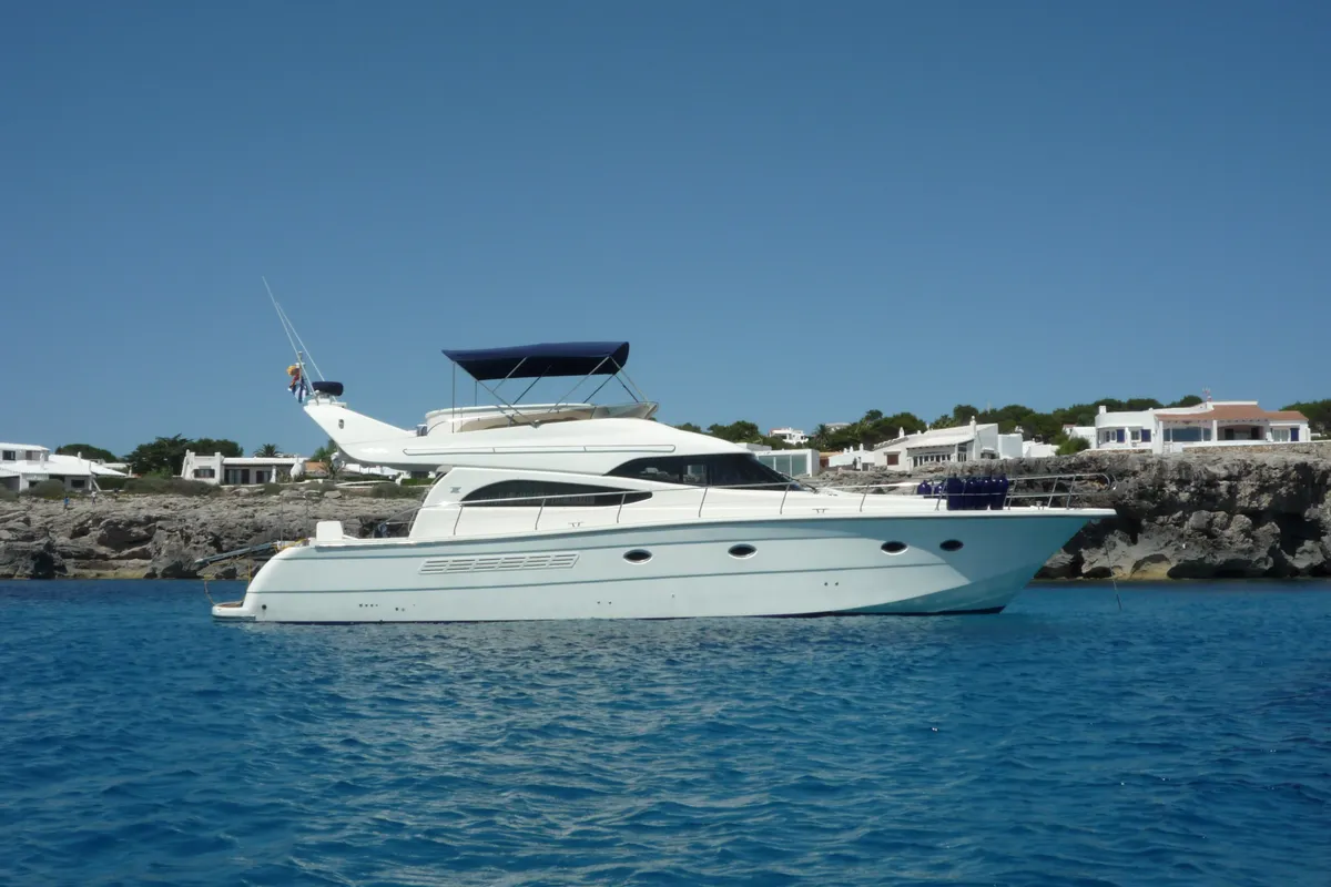 Exterior view of Port Ligat, a Rodman 56 Fly motor yacht at Port d'Andratx, Spain