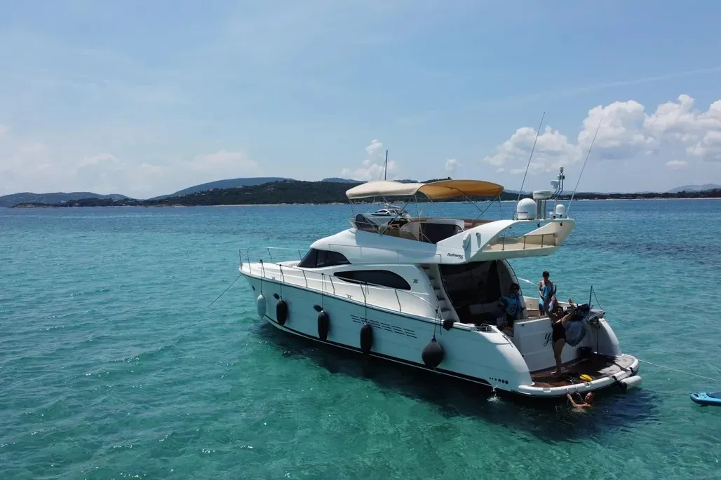 Exterior view of Port Ligat, a Rodman 56 Fly motor yacht at Port d'Andratx, Spain