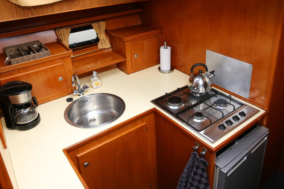 Galley of Antaris, a Vri-Jon Contessa 37 motorboat at Heukelum, Netherlands