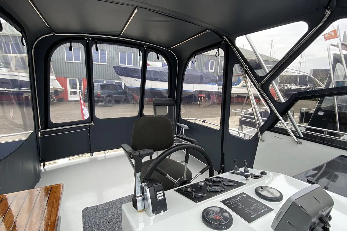 Cockpit of Antaris, a Vri-Jon Contessa 37 motorboat at Heukelum, Netherlands