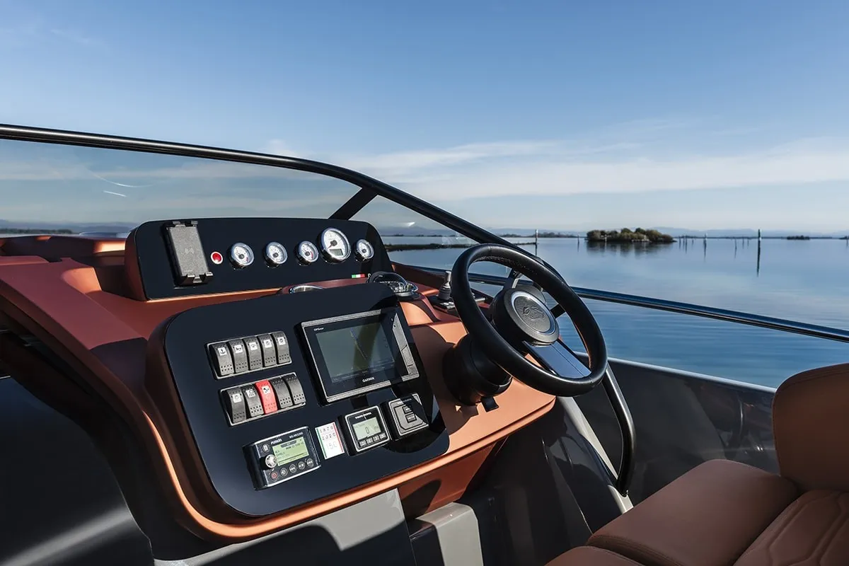 Cockpit of Aurora, a Cranchi E30 Endurance motorboat at Olbia, Italy
