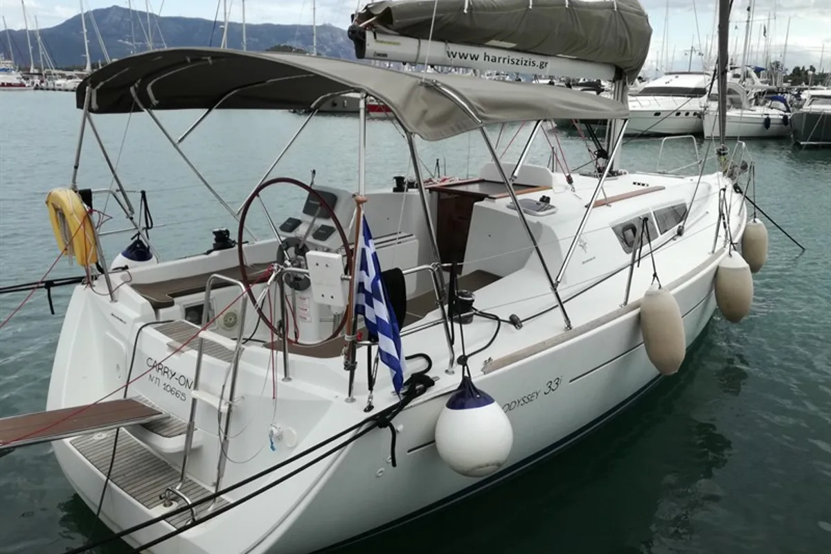 Exterior view of Carry On, a Jeanneau Sun Odyssey 33i sailboat at Kontokali, Greece