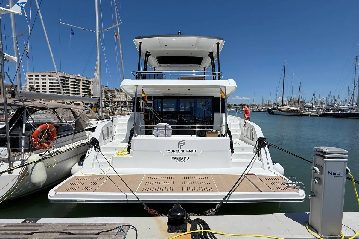 Exterior view of Mamma Mia, a Fountaine Pajot MY6 catamaran at Palma de Mallorca, Spain