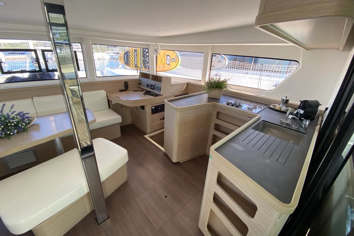 Salon of Alkaid, a Lagoon 42 catamaran at Olbia, Italy
