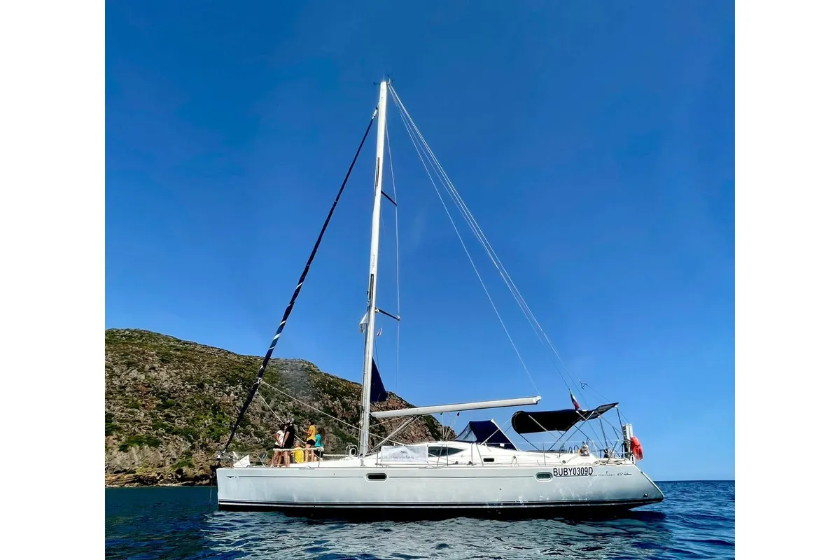 Exterior view of Sunset, a Jeanneau Sun Odyssey 49DS sailboat at San Vincenzo, Italy