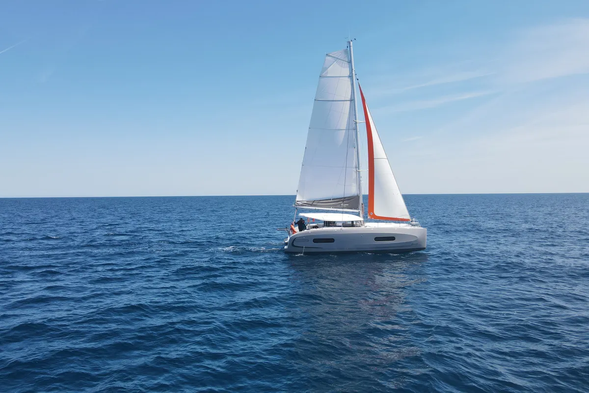 Exterior view of KAZBEGI , a Excess 11 catamaran at Port de Pollença, Spain