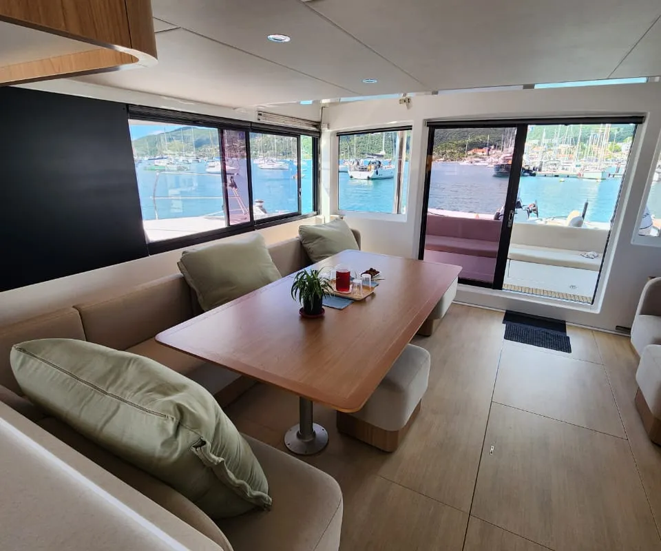 Salon of Four C'S, a Bali 5.8 catamaran at Hyères, France