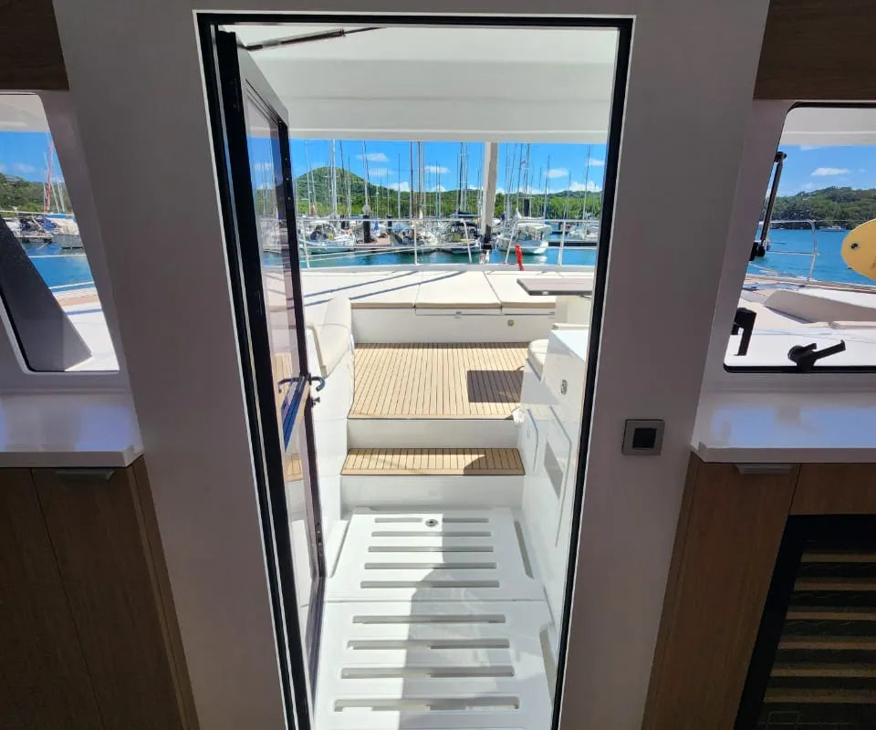 Salon of Four C'S, a Bali 5.8 catamaran at Hyères, France