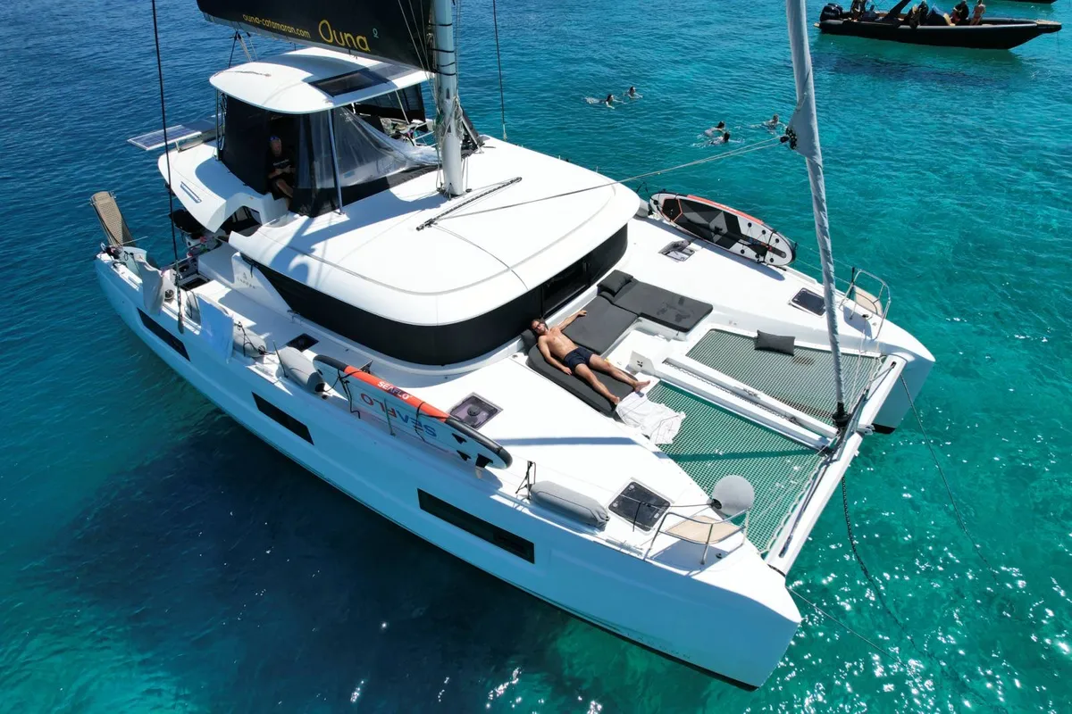 Exterior view of Ouna, a Lagoon 46 catamaran at Parikia, Greece