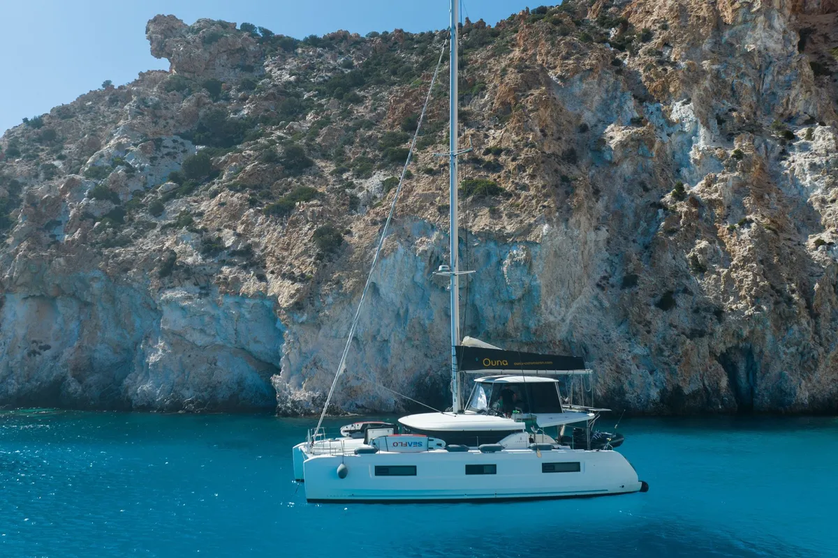 Exterior view of Ouna, a Lagoon 46 catamaran at Parikia, Greece