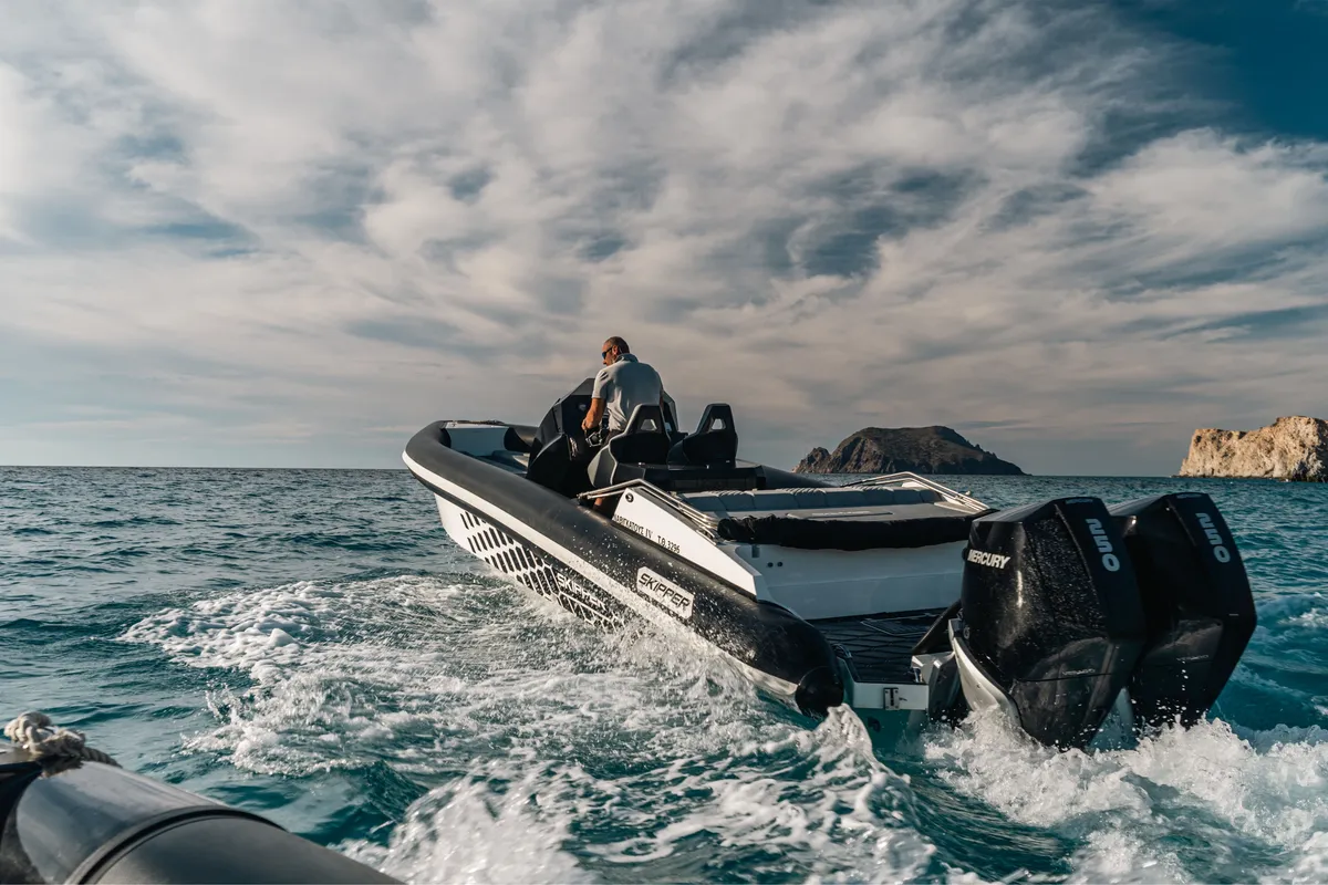 Exterior view of Navigatus IV, a Gulet Skipper-NC-100S-18 motorboat at Adamantas, Greece