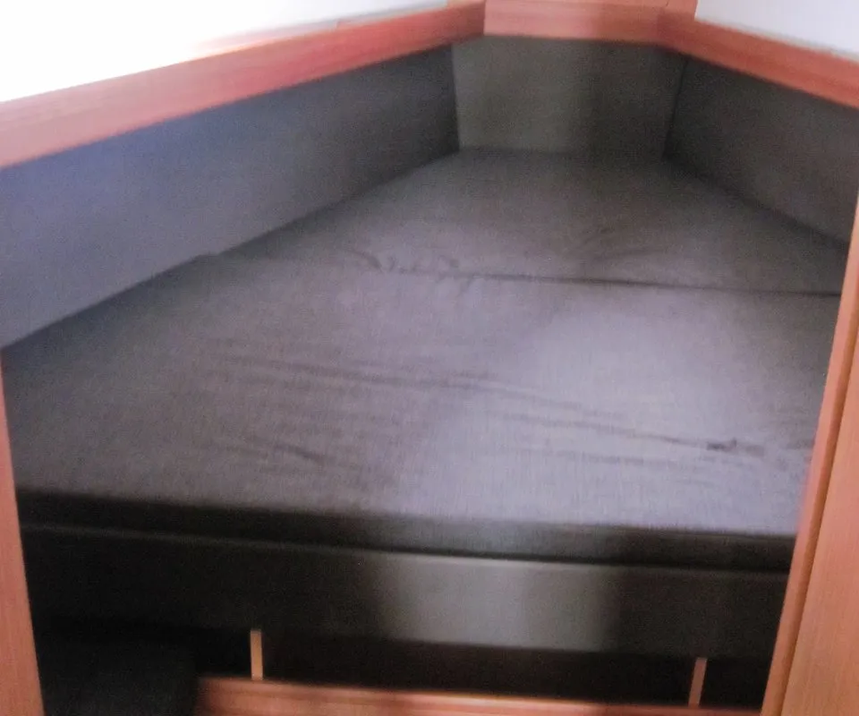 Cabin on Marina, a Bavaria Cruiser 41 sailboat at Capo d'Orlando, Italy