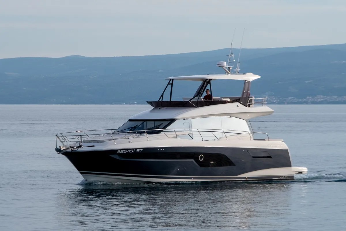 Exterior view of Baby Indy, a Jeanneau Prestige 520 Flybridge motor yacht at Split, Croatia