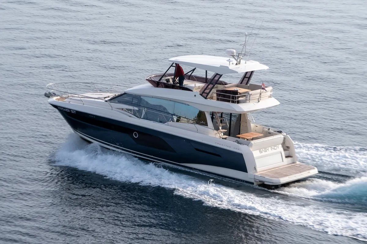 Exterior view of Baby Indy, a Jeanneau Prestige 520 Flybridge motor yacht at Split, Croatia