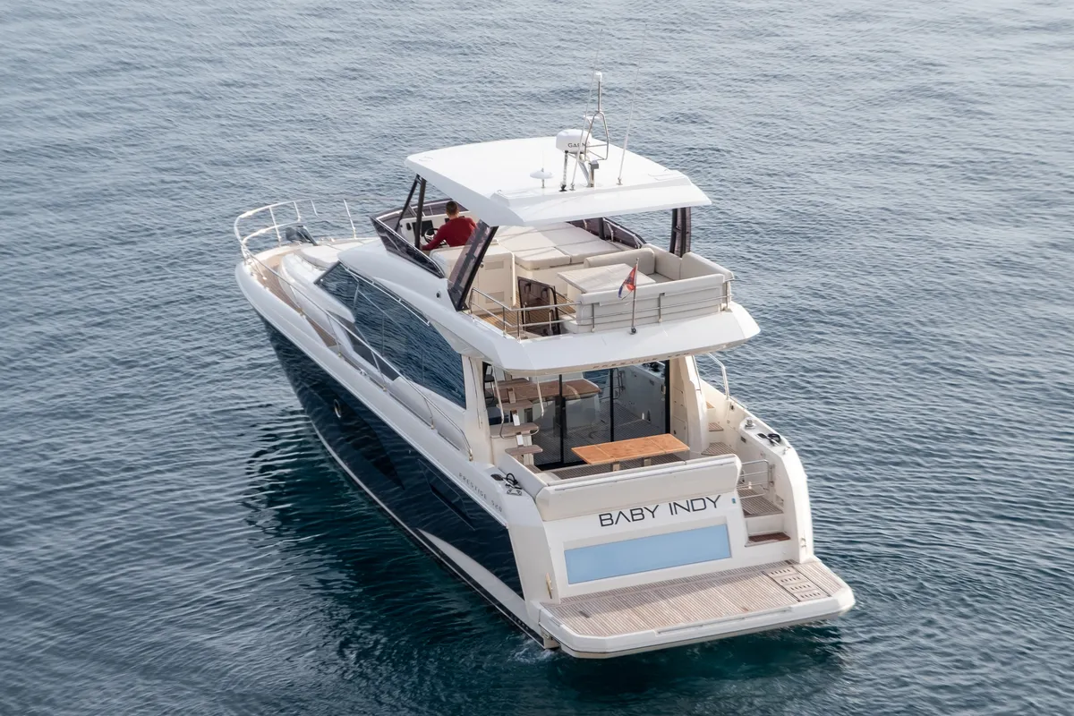 Exterior view of Baby Indy, a Jeanneau Prestige 520 Flybridge motor yacht at Split, Croatia