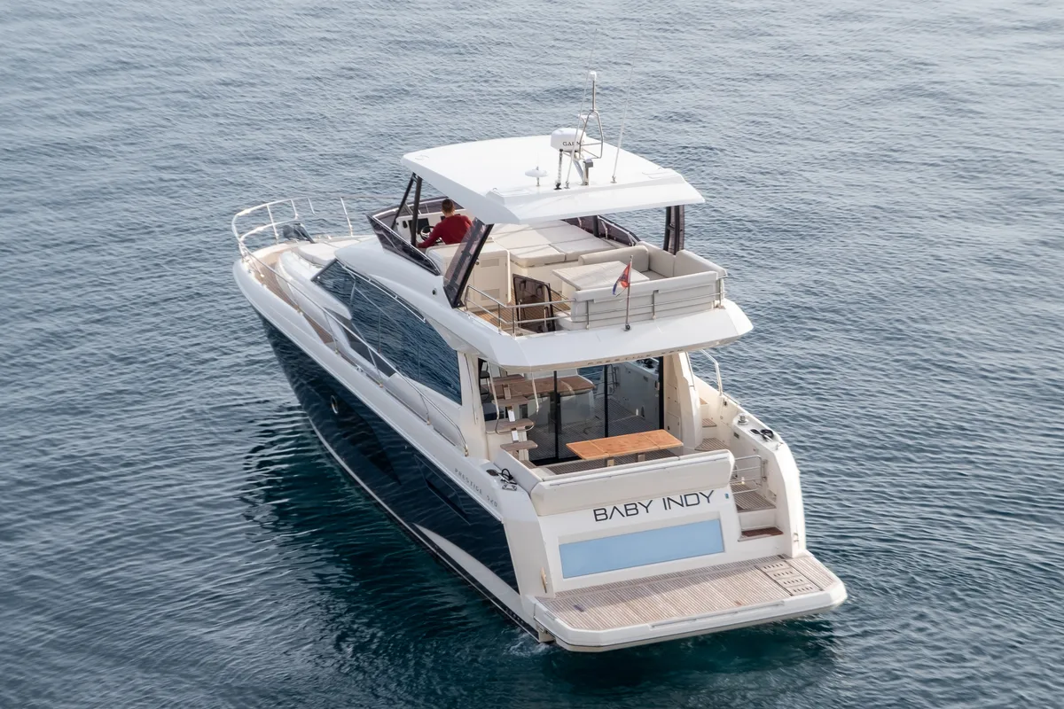 Exterior view of Baby Indy, a Jeanneau Prestige 520 Flybridge motor yacht at Split, Croatia