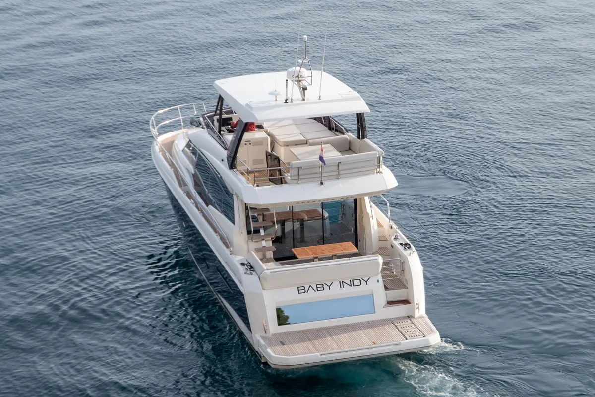 Exterior view of Baby Indy, a Jeanneau Prestige 520 Flybridge motor yacht at Split, Croatia