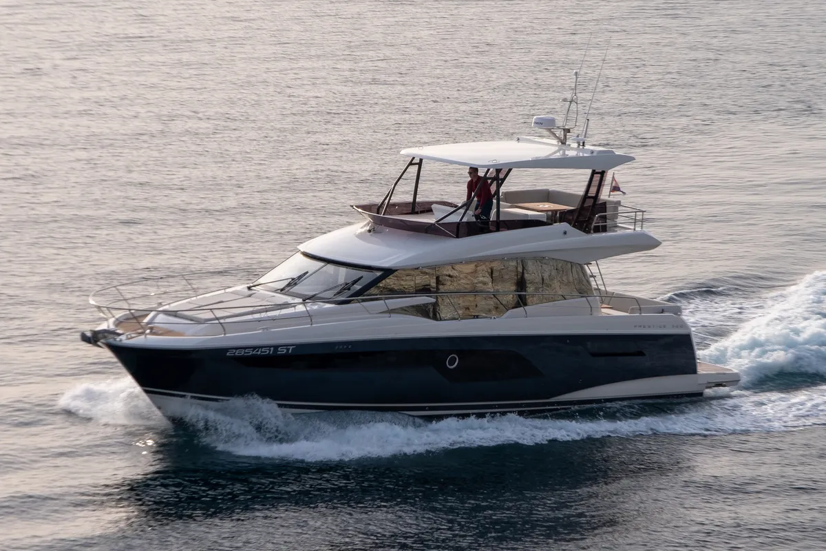 Exterior view of Baby Indy, a Jeanneau Prestige 520 Flybridge motor yacht at Split, Croatia