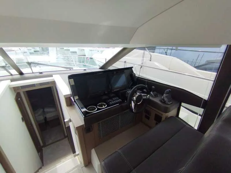 Cockpit of Baby Indy, a Jeanneau Prestige 520 Flybridge motor yacht at Split, Croatia