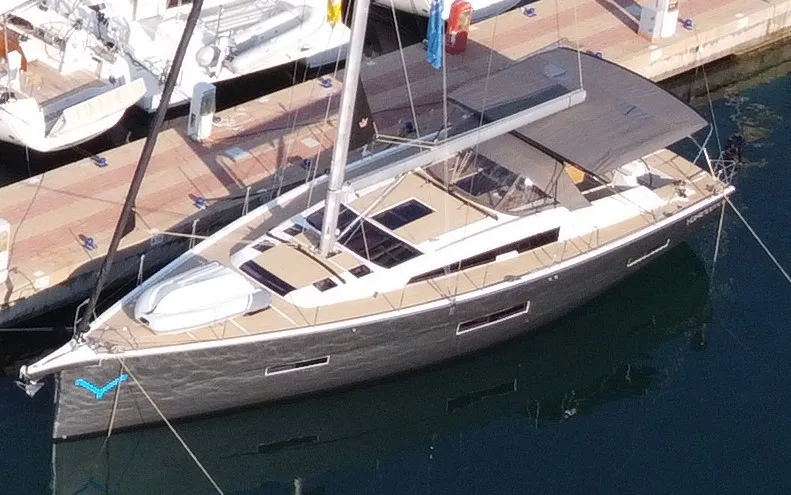 Exterior view of Silente, a Dufour 56 Exclusive sailboat at Olbia, Italy