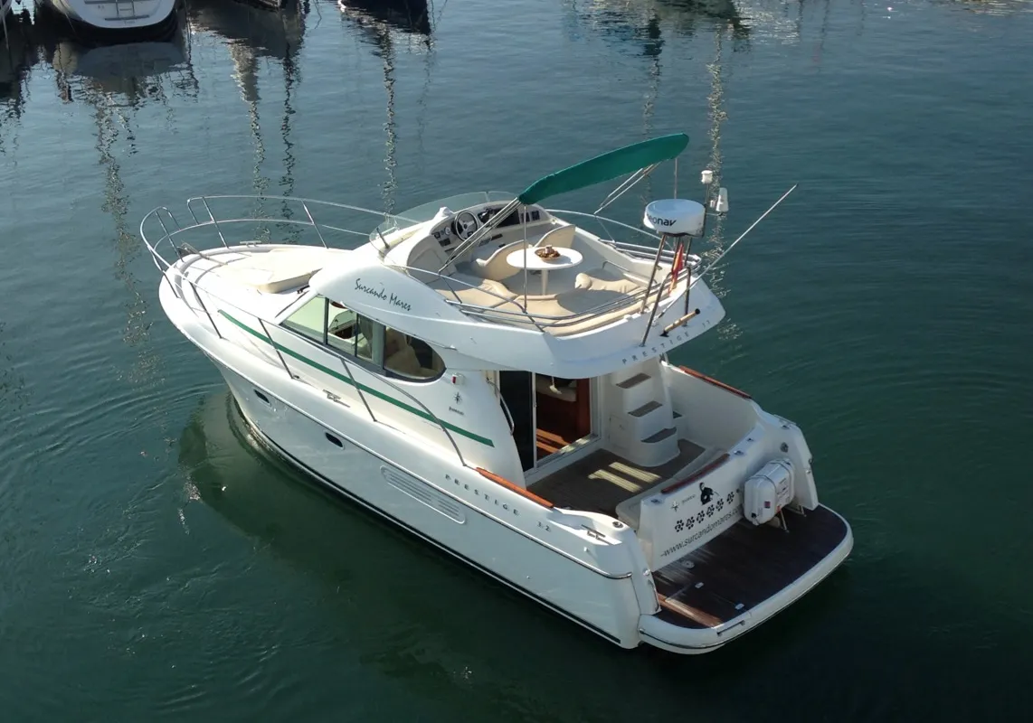 Exterior view of Kazan I, a Prestige 32 motorboat at Sitges, Spain