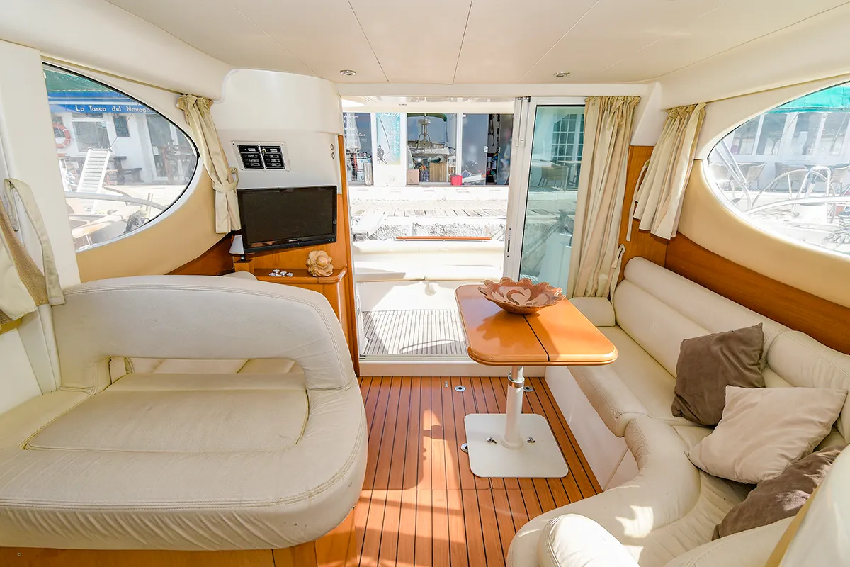 Salon of Kazan I, a Prestige 32 motorboat at Sitges, Spain