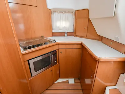Galley of Kazan I, a Prestige 32 motorboat at Sitges, Spain