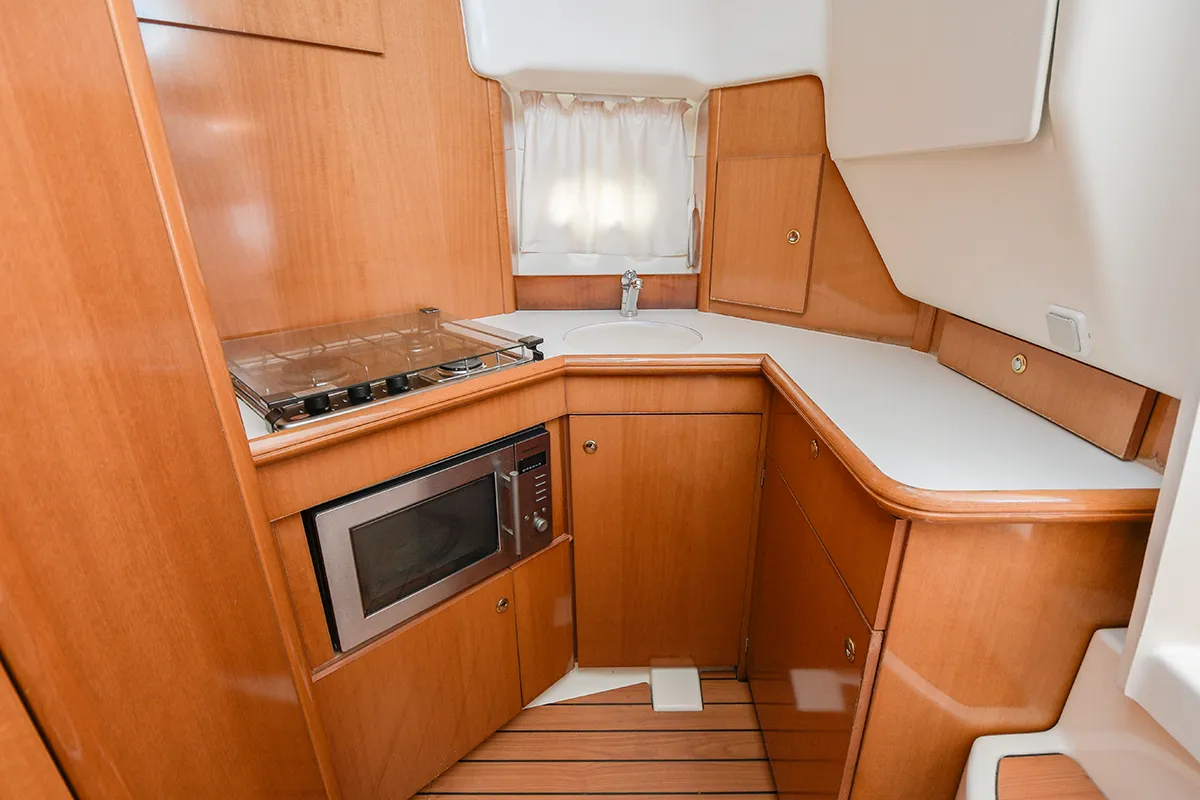 Galley of Kazan I, a Prestige 32 motorboat at Sitges, Spain