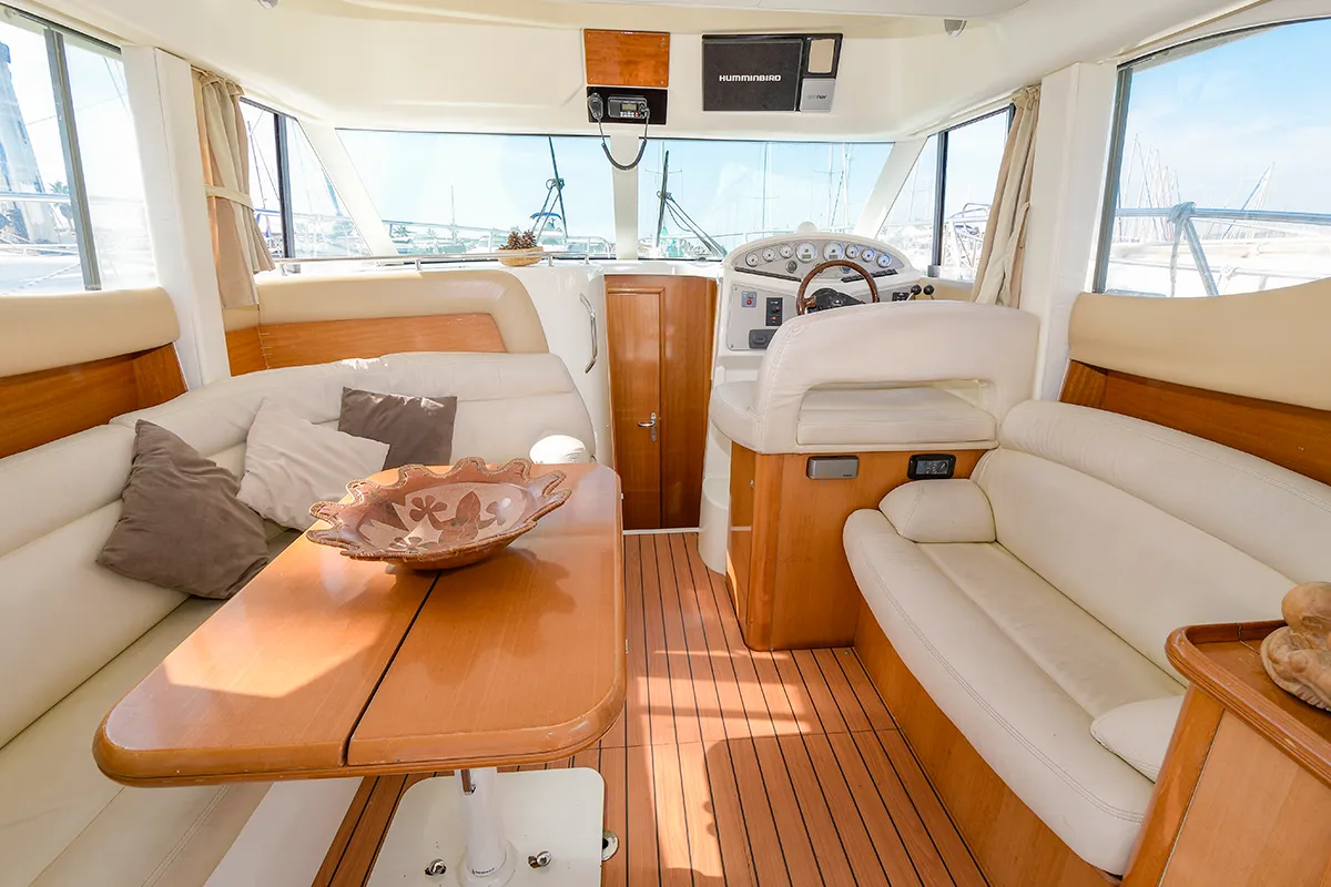 Salon of Kazan I, a Prestige 32 motorboat at Sitges, Spain