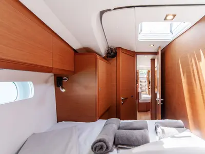 Cabin on Montecarlo, a Jeanneau Sun Odyssey 519 sailboat at Capo d'Orlando, Italy