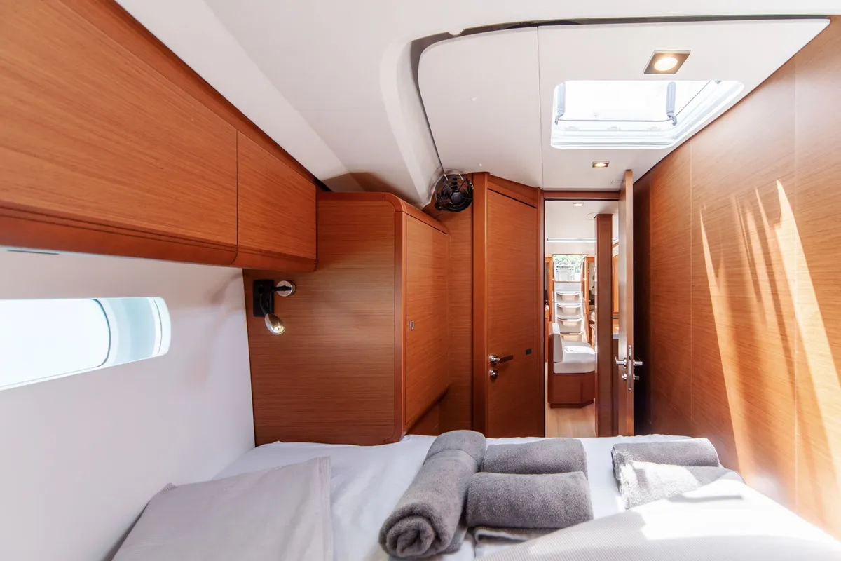 Cabin on Montecarlo, a Jeanneau Sun Odyssey 519 sailboat at Capo d'Orlando, Italy