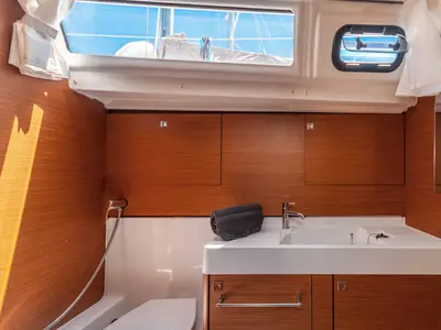 Head on Montecarlo, a Jeanneau Sun Odyssey 519 sailboat at Capo d'Orlando, Italy